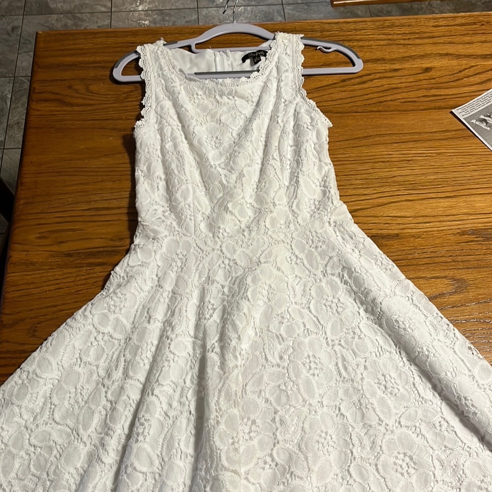 Pretty white lace dress.